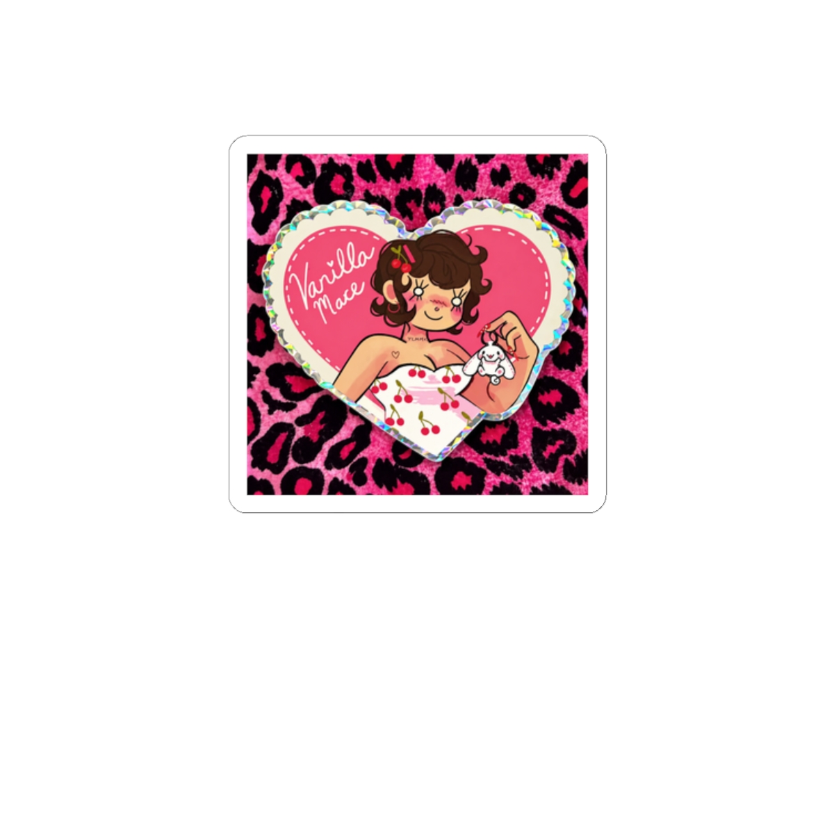 A heart-shaped sticker featuring a cartoon illustration of a person holding a small white figure. The sticker has the text "Vanilla Mace" and a cherry pattern on the dress. The background is a pink... - alternate angle 3, merchandise