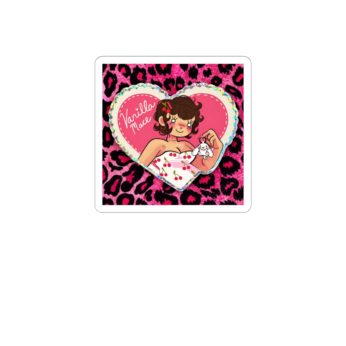 A heart-shaped sticker featuring a cartoon illustration of a person holding a small white figure. The sticker has the text "Vanilla Mace" and a cherry pattern on the dress. The background is a pink...